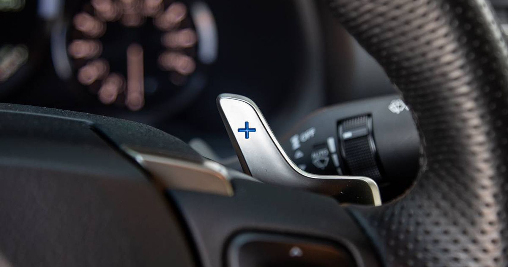A Small Paddle-Like Protuberance On The Back Of The Steering Wheel Called A Paddle Shifter Is What Helps A Driver Have A Semblance Of Control
