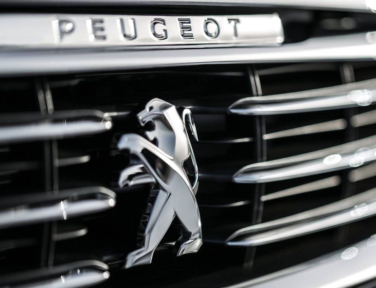 Peugeot Logo on car grille