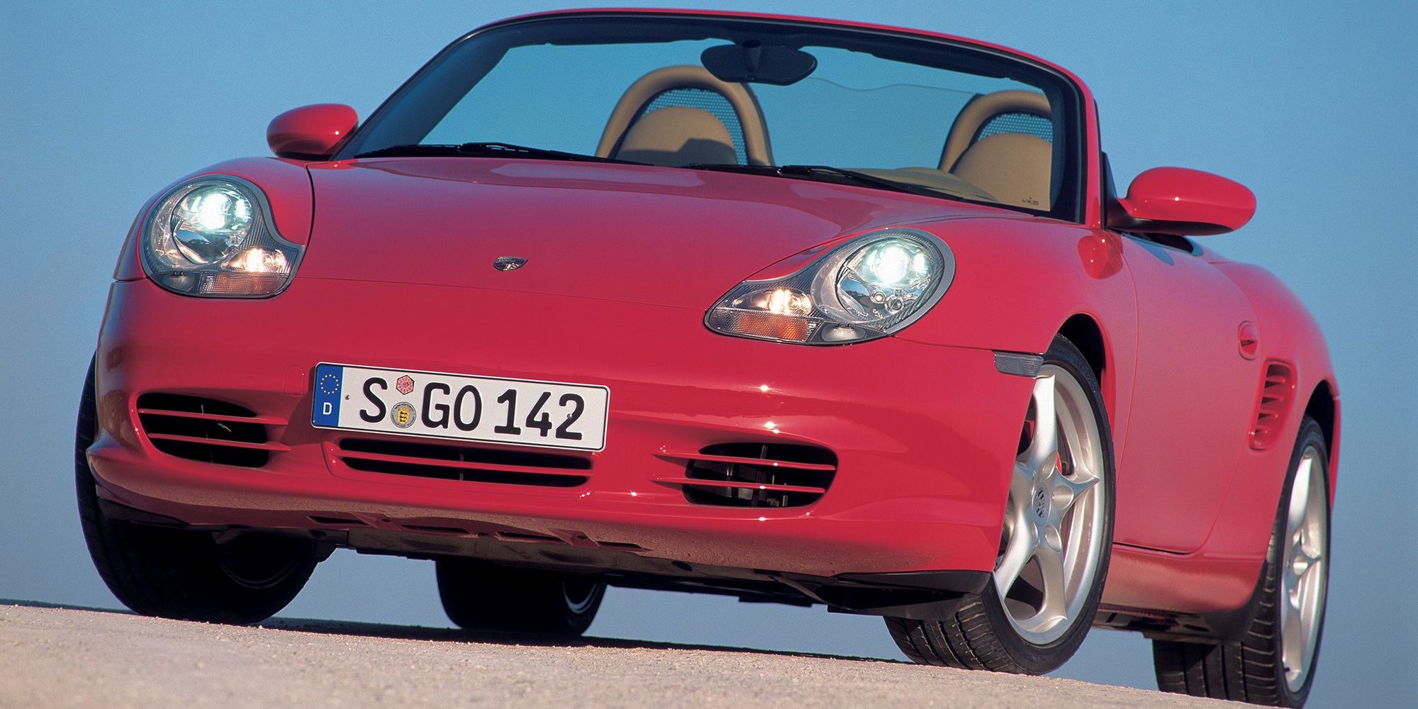 The front of a red 986 Boxster