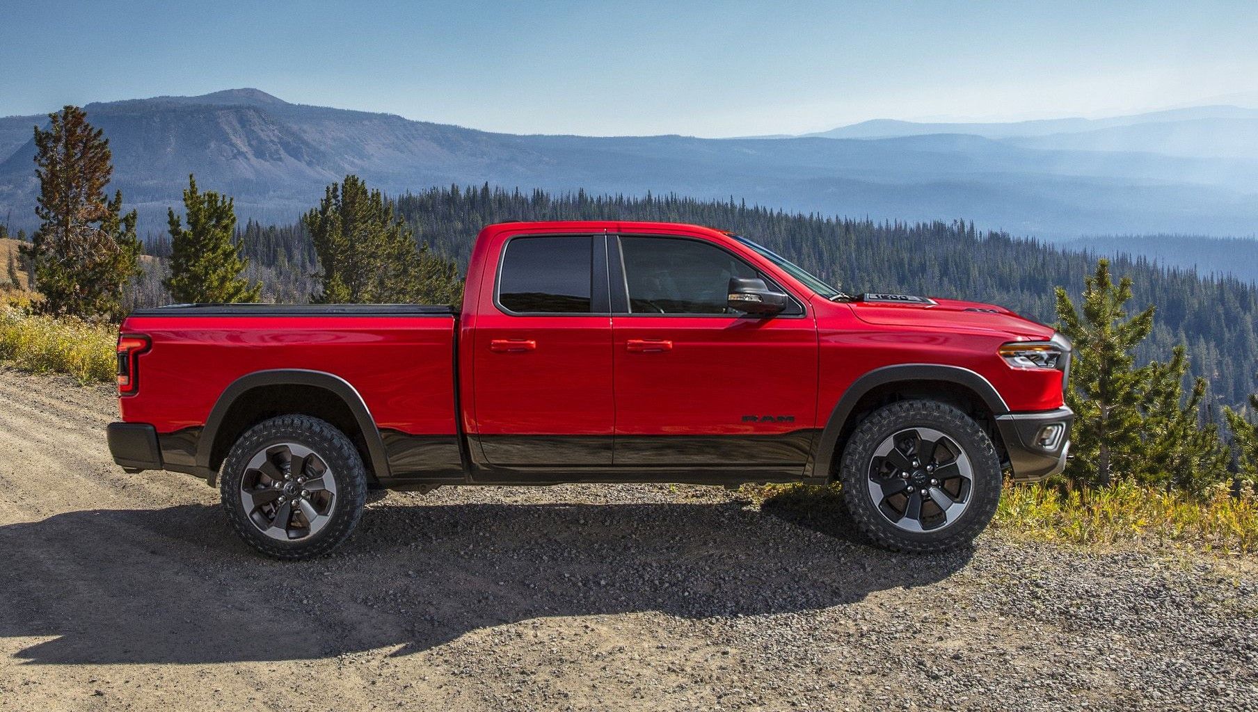 red Ram Dakota parked on an off-road road.