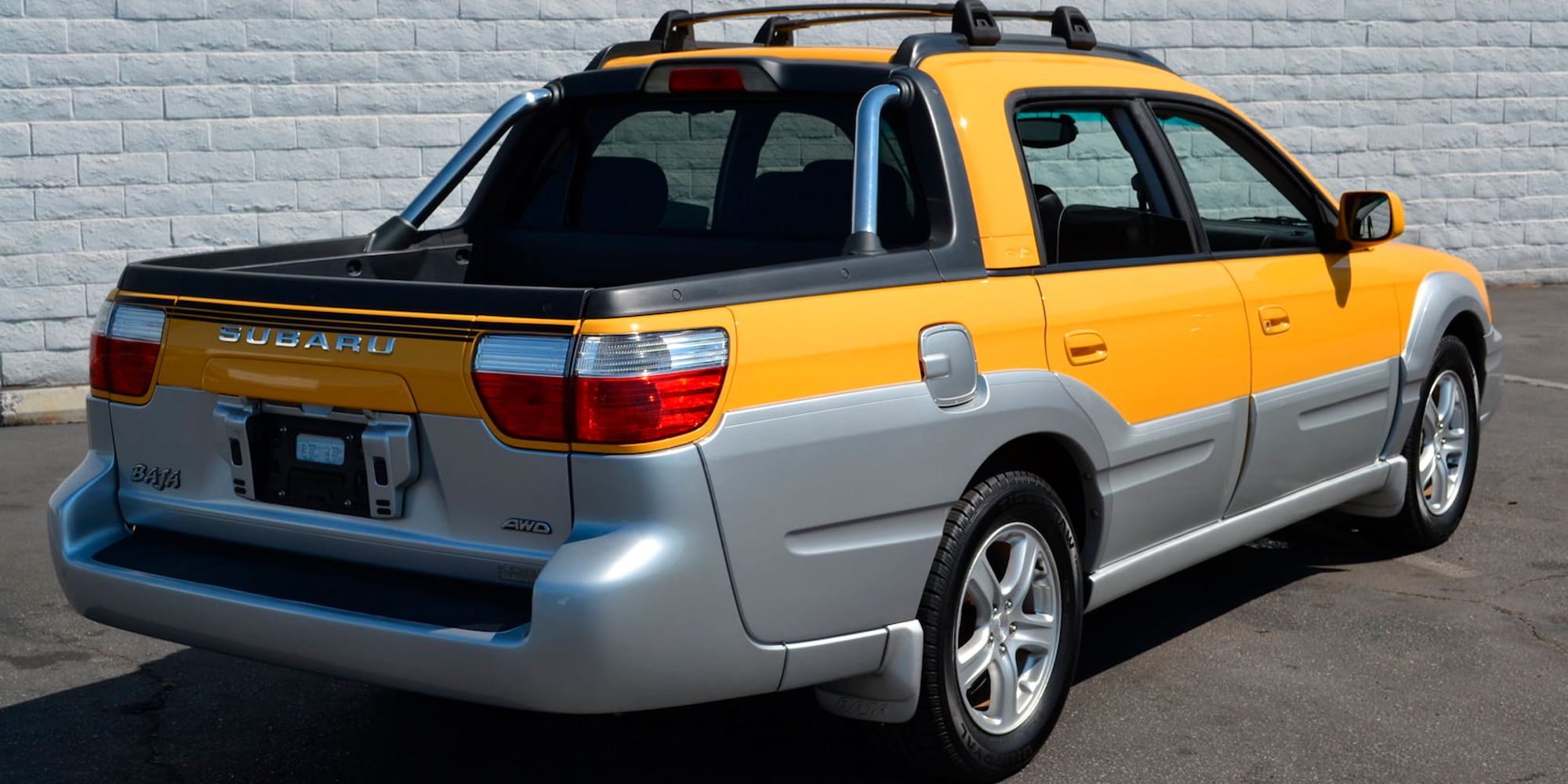 A two-tone yellow and silver Baja