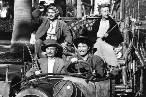 The characters of the TV show The Beverly Hillbillies drive around in their 1921 Oldsmobile.