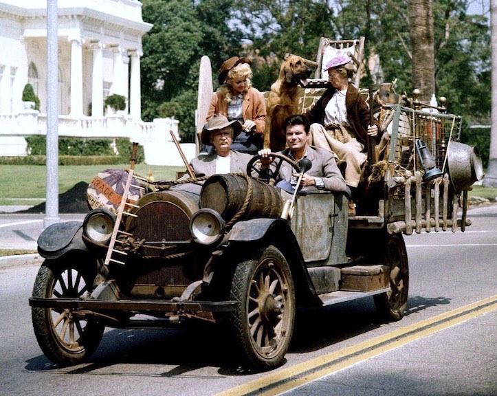The Missouri family in the TV show The Beverly Hillbillies are seen driving around in their 1921 Oldsmobile.