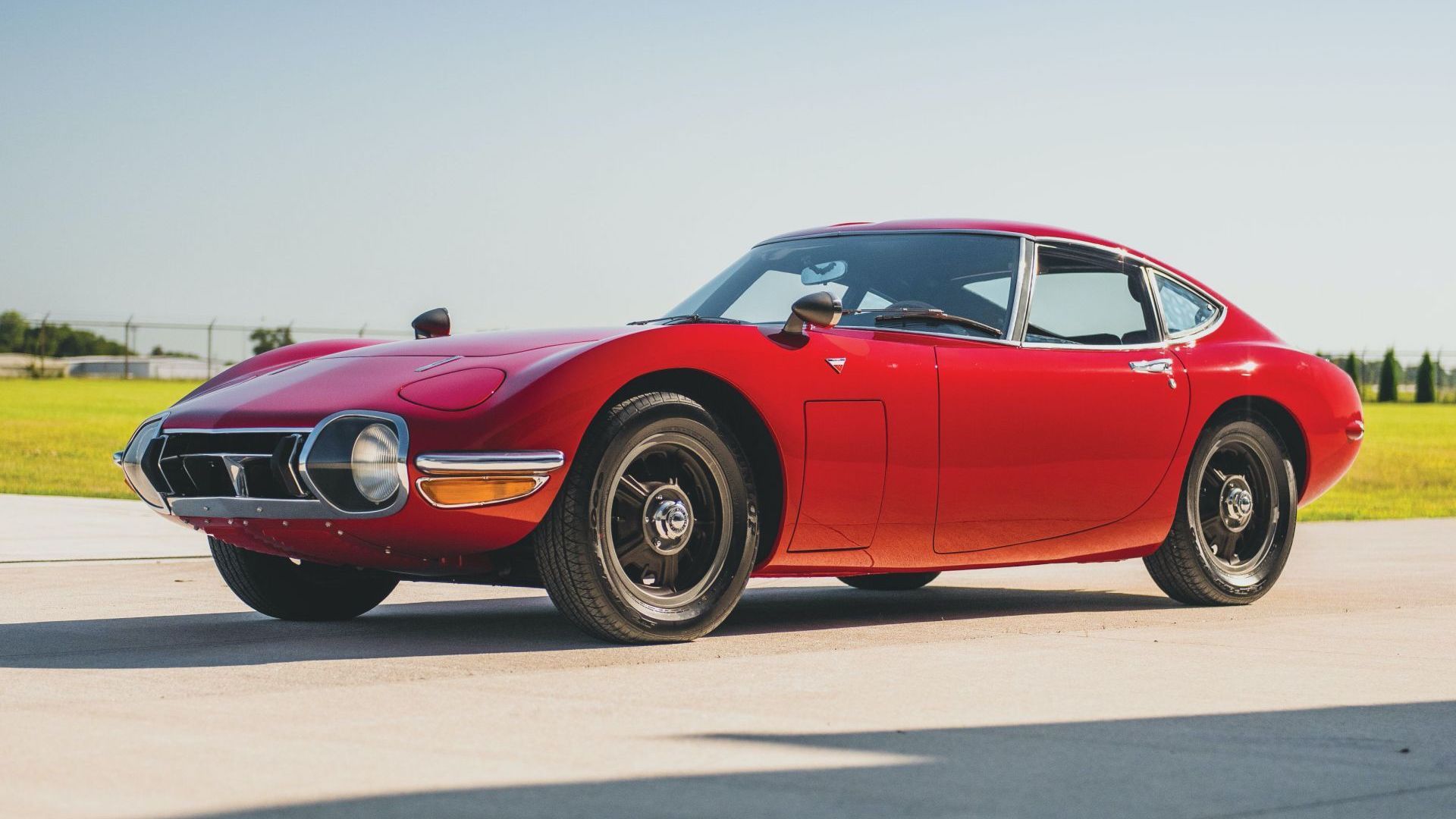 Toyota 2000GT parked outside