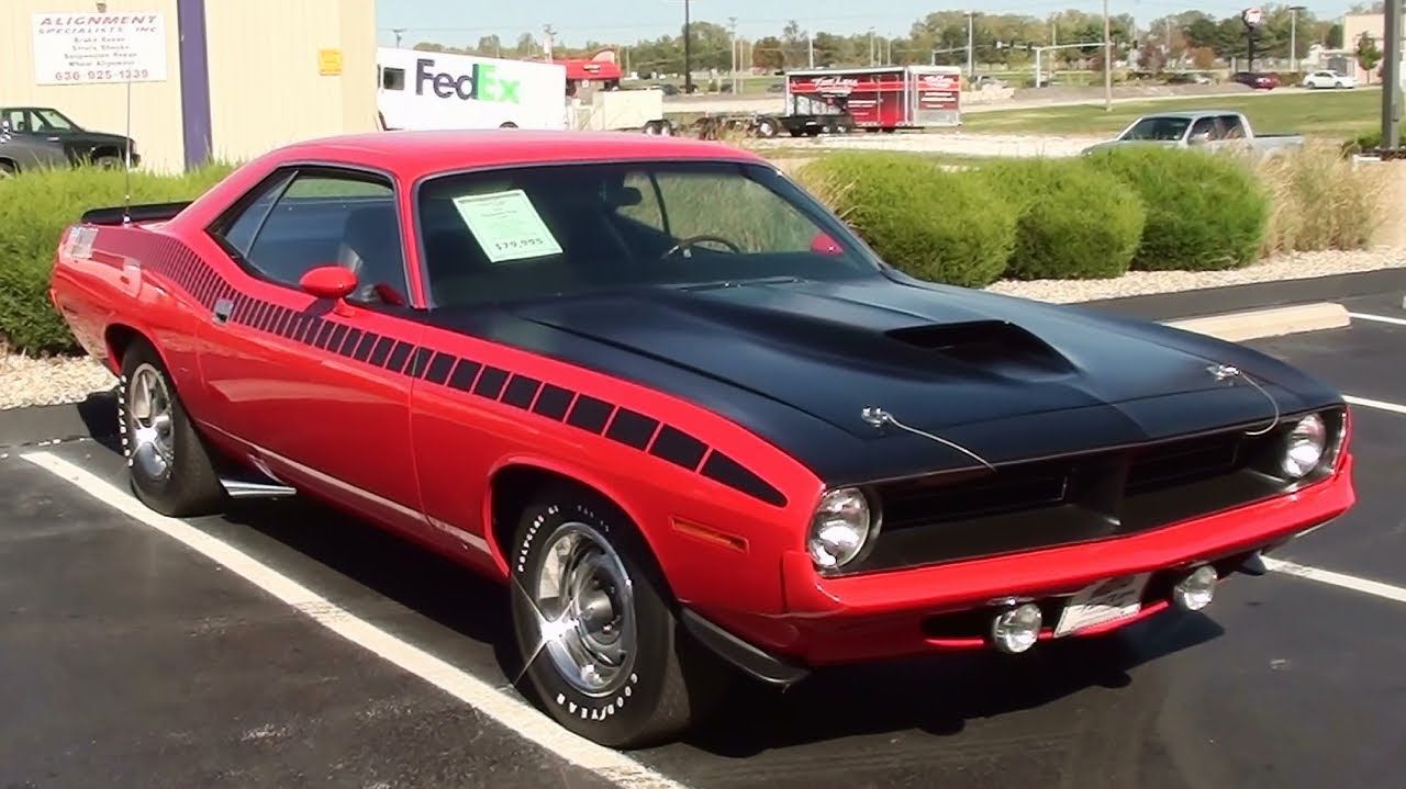 1970 Plymouth Cuda AAR parked outside