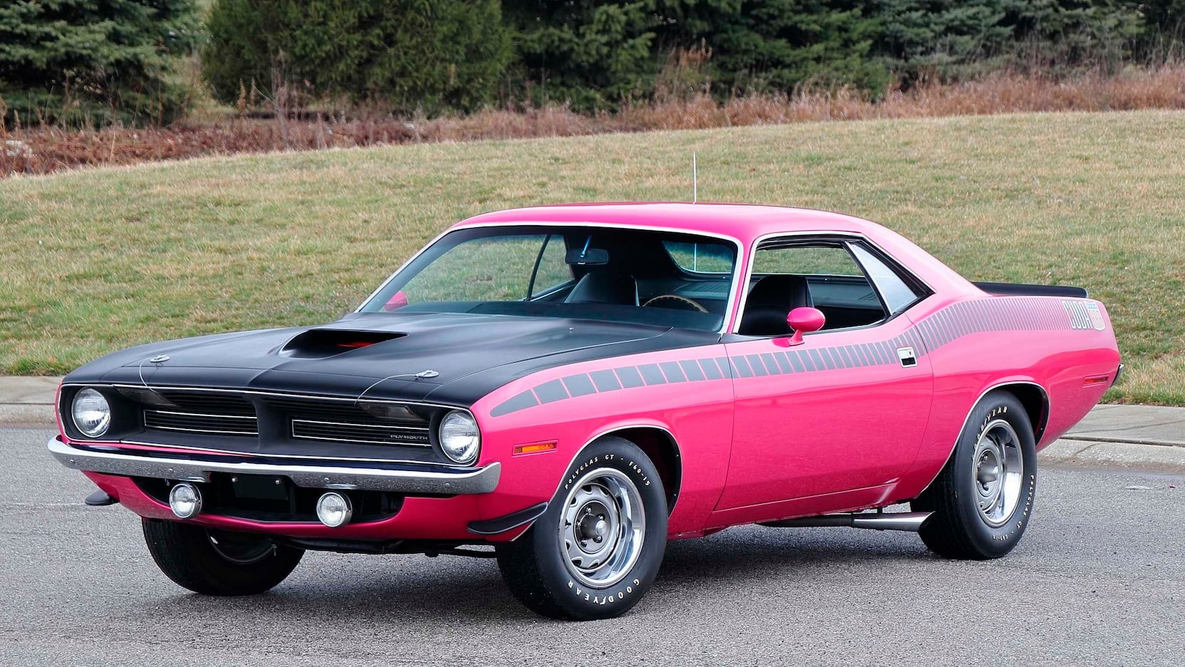 1970 Plymouth Cuda AAR parked outside