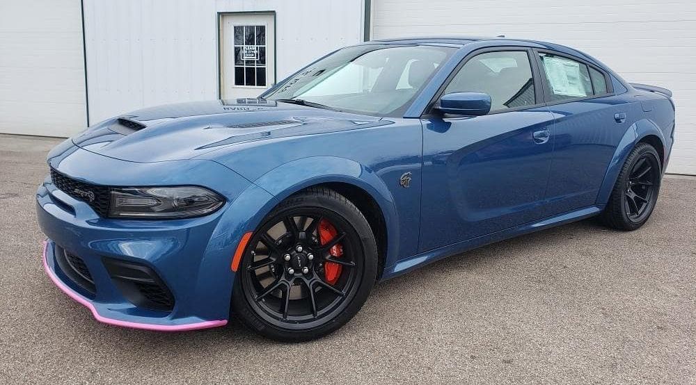 2021 Dodge Charger Hellcat Redeye parked by building