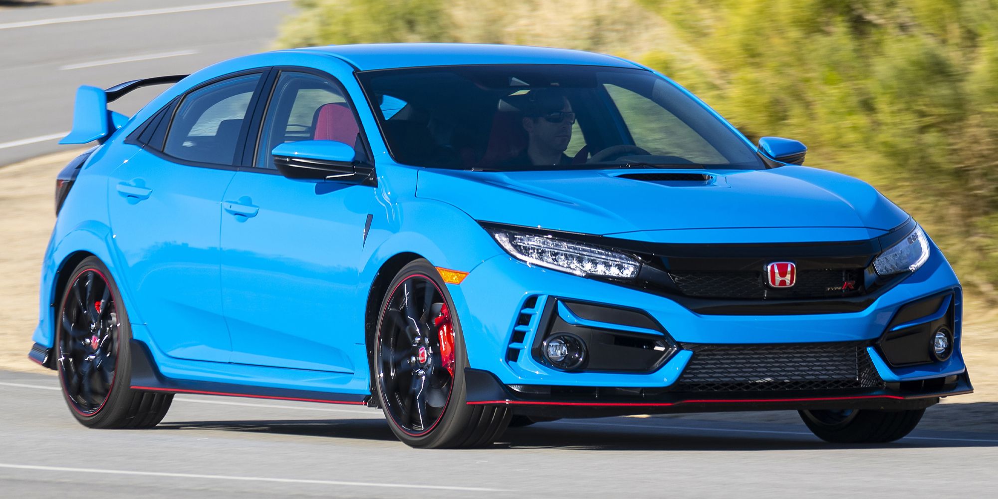 A blue FK8 Type R on the move