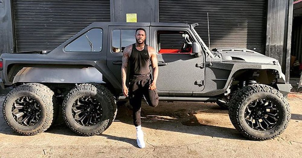 Dodgers pitcher Yadier Álvarez poses with his new Apocalypse Hellfire truck