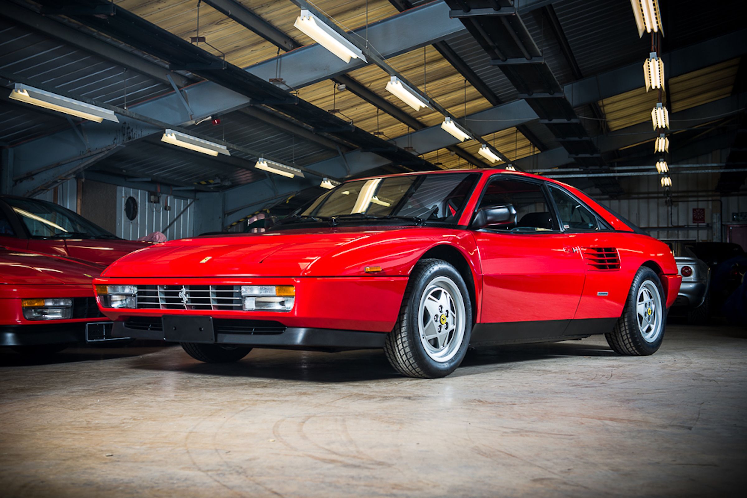 Ferrari Mondial in a garage