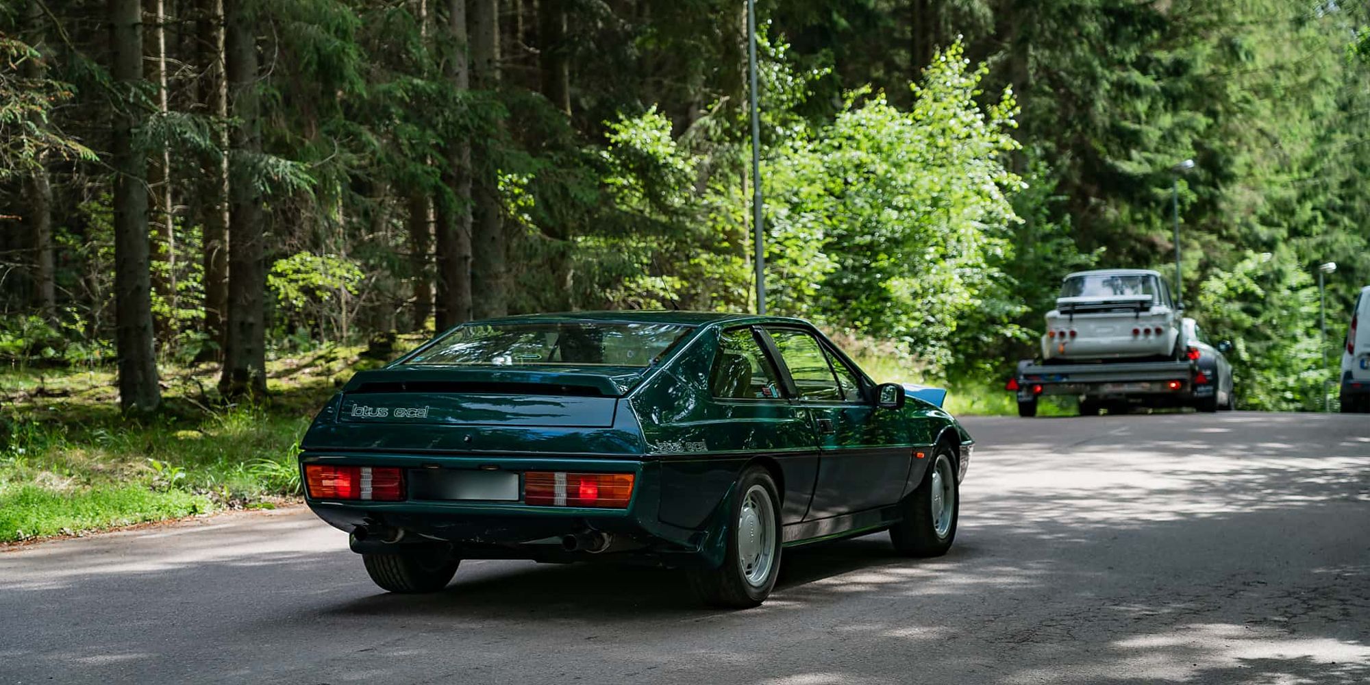 The rear of a green Lotus Excel