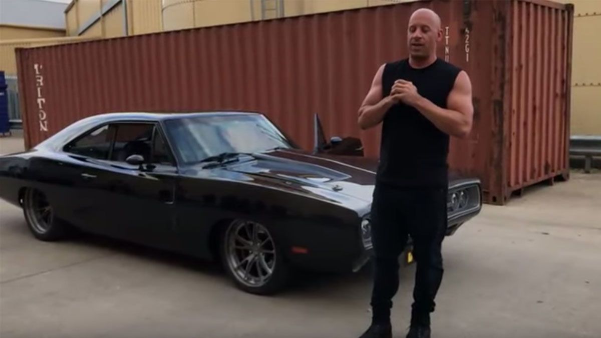 Vin Diesel standing next to his Speedkore Tantrum