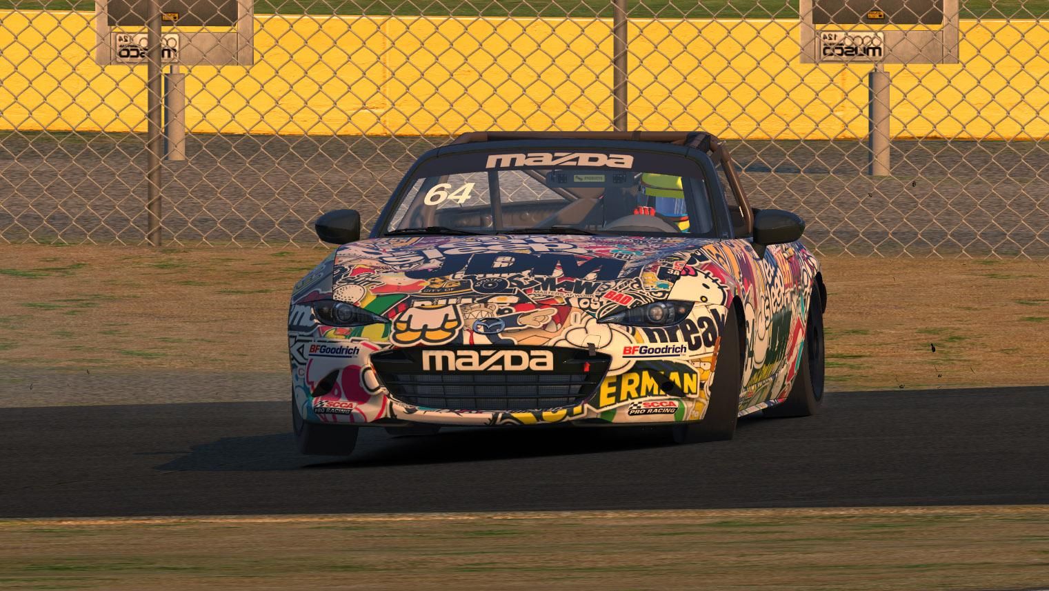 sticker bombed car on racetrack