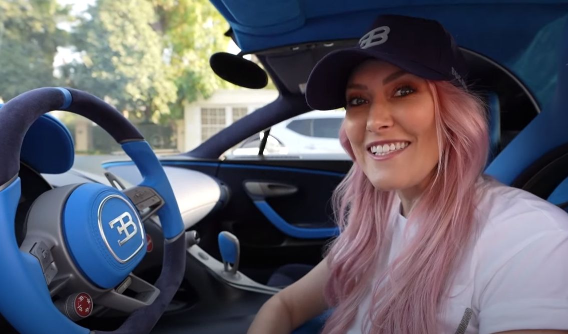 Supercar Blondie sits in the driver side of a Bugatti Divo