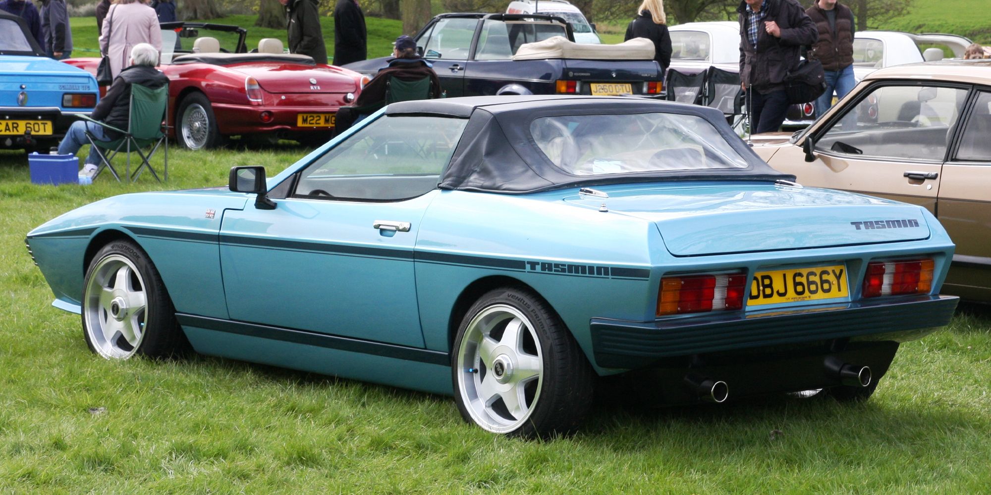 The rear of a blue Tasmin convertible