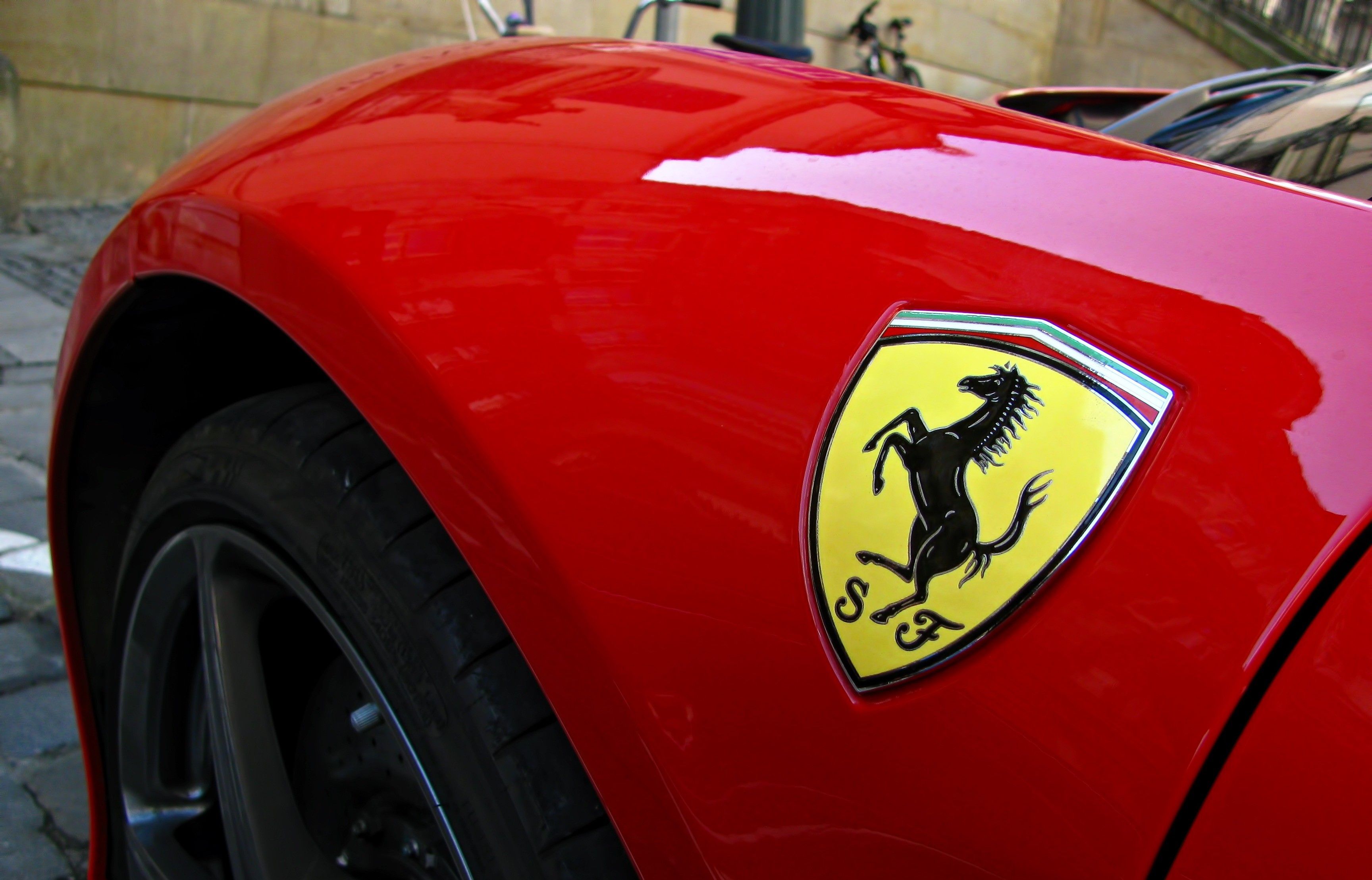 Ferrari Logo On Red Car