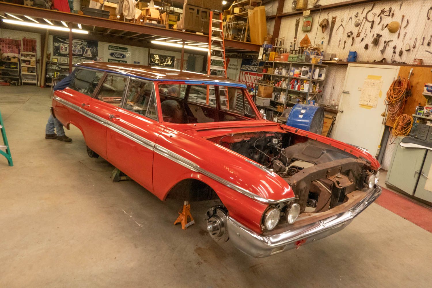 Stripped 1962 Ford Country Sedan in shop
