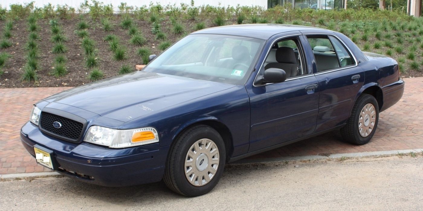 Ford Crown Victoria, blue, front quarter, parked