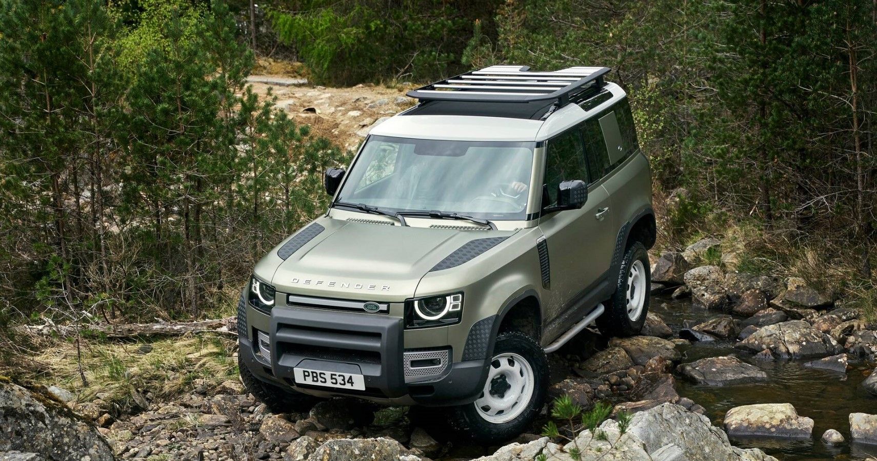 2021 Land Rover Defender front third quarter off-roading view