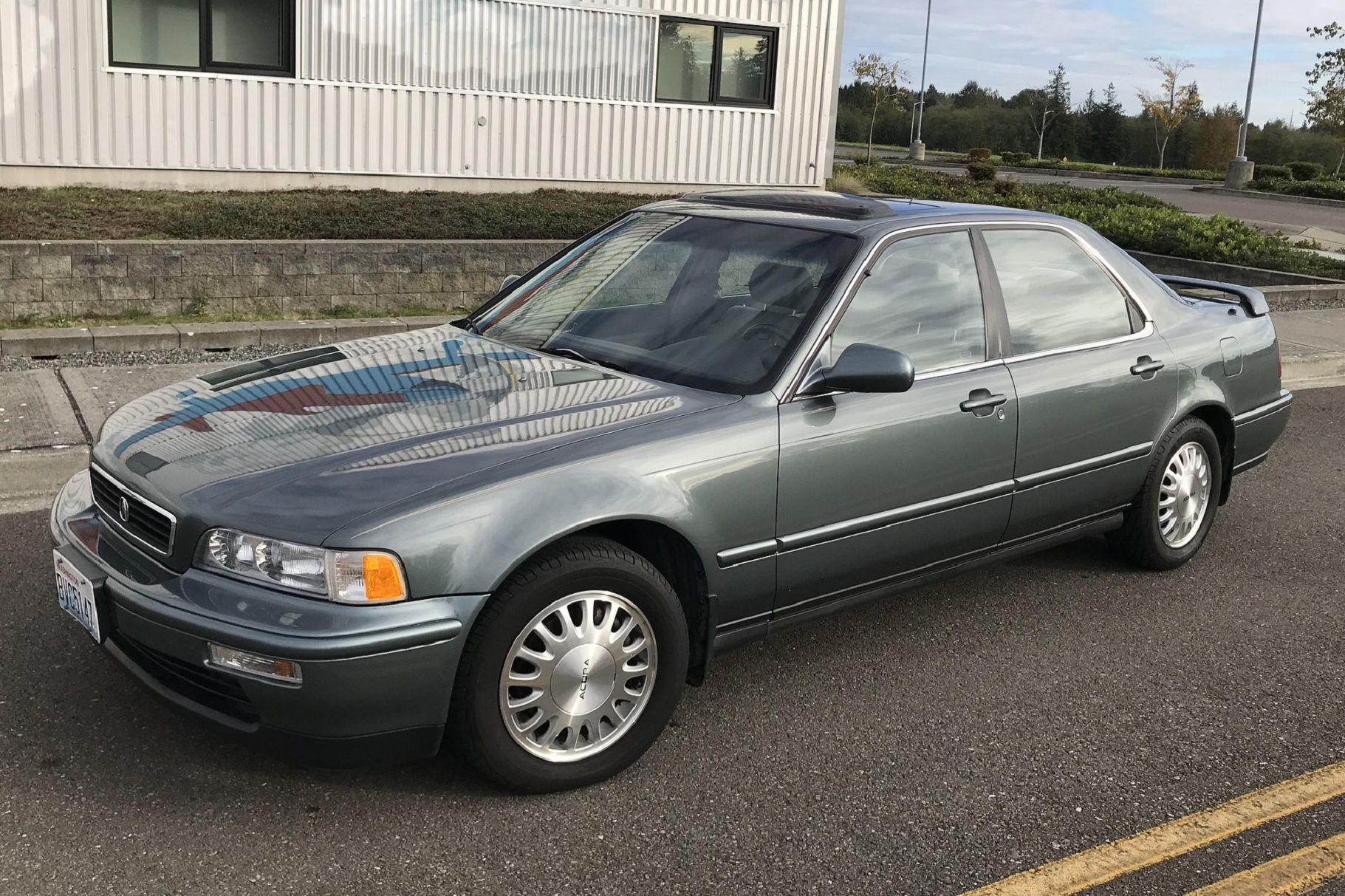 Acura Legend parked on the road