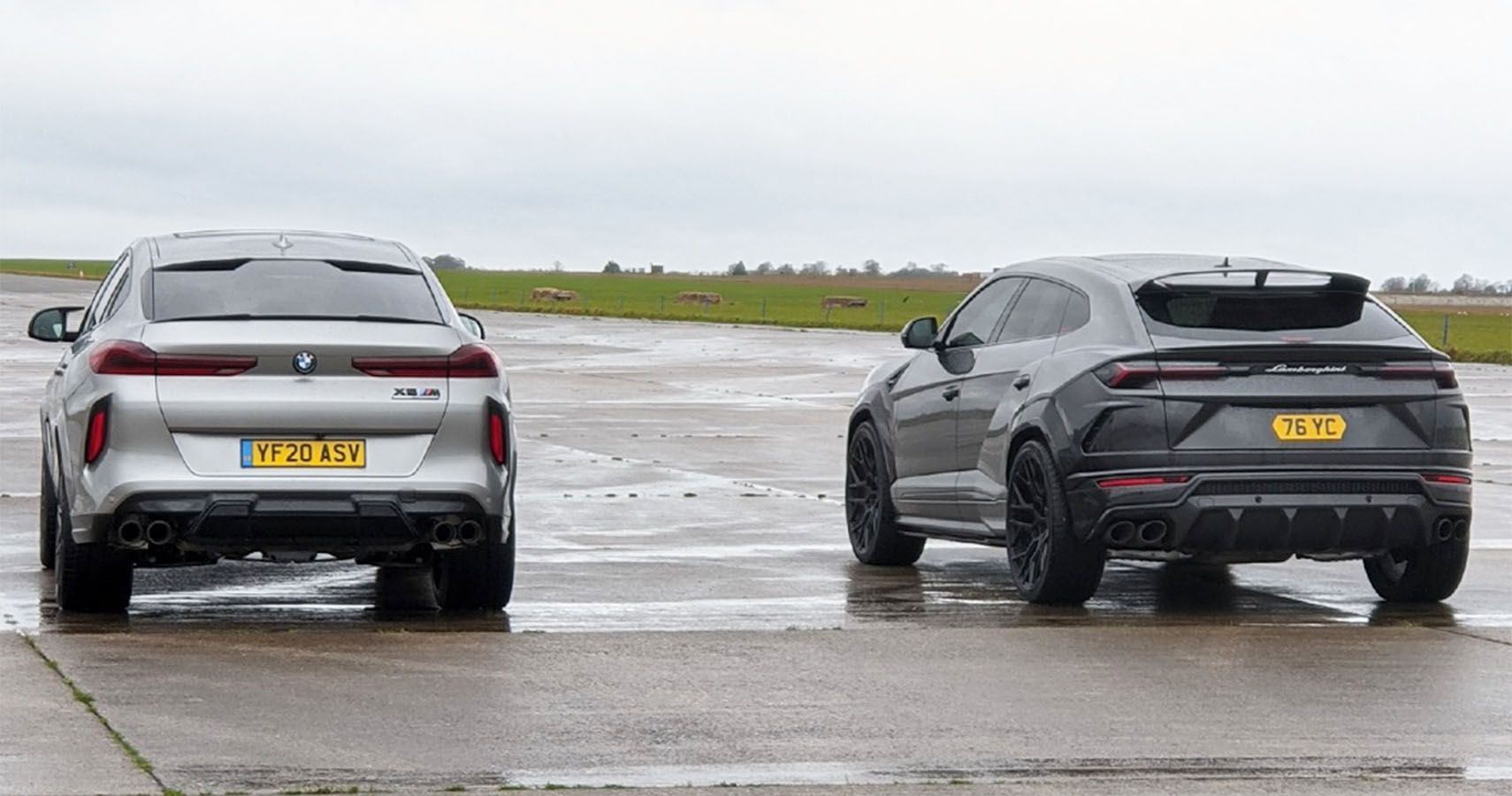 Watch A Lambo Urus Drag Race A BMW X6M Competition On A Wet Airstrip