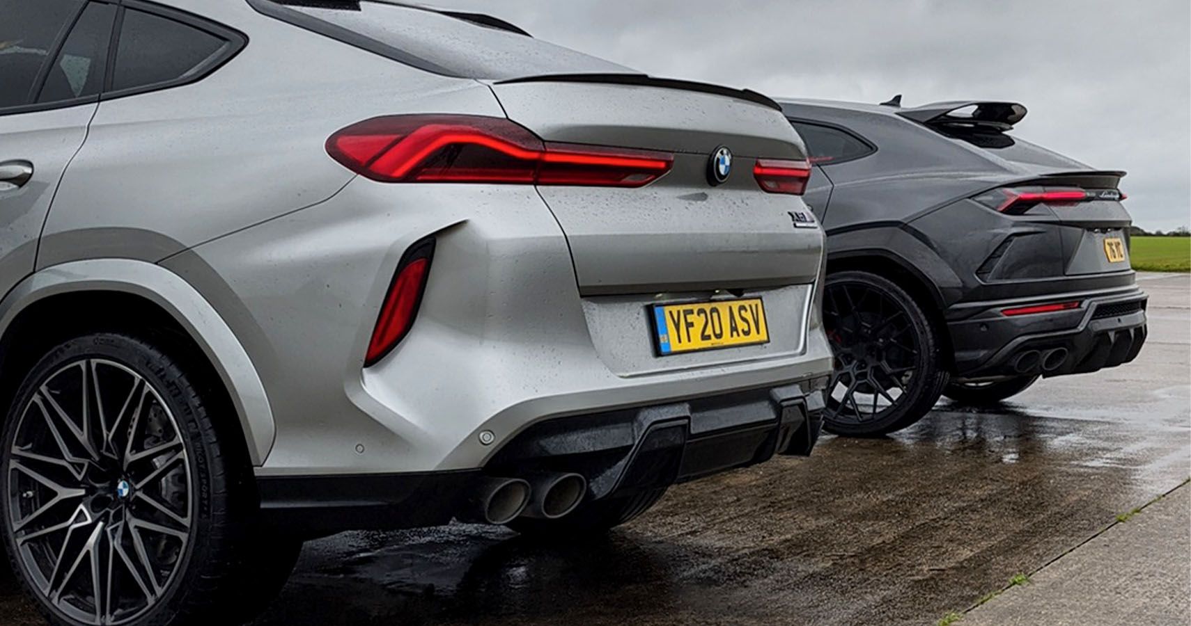 Watch A Lambo Urus Drag Race A BMW X6M Competition On A Wet Airstrip