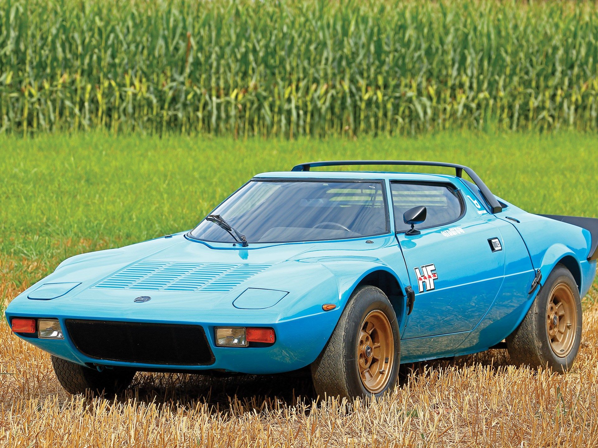 Lancia Stratos parked in a field