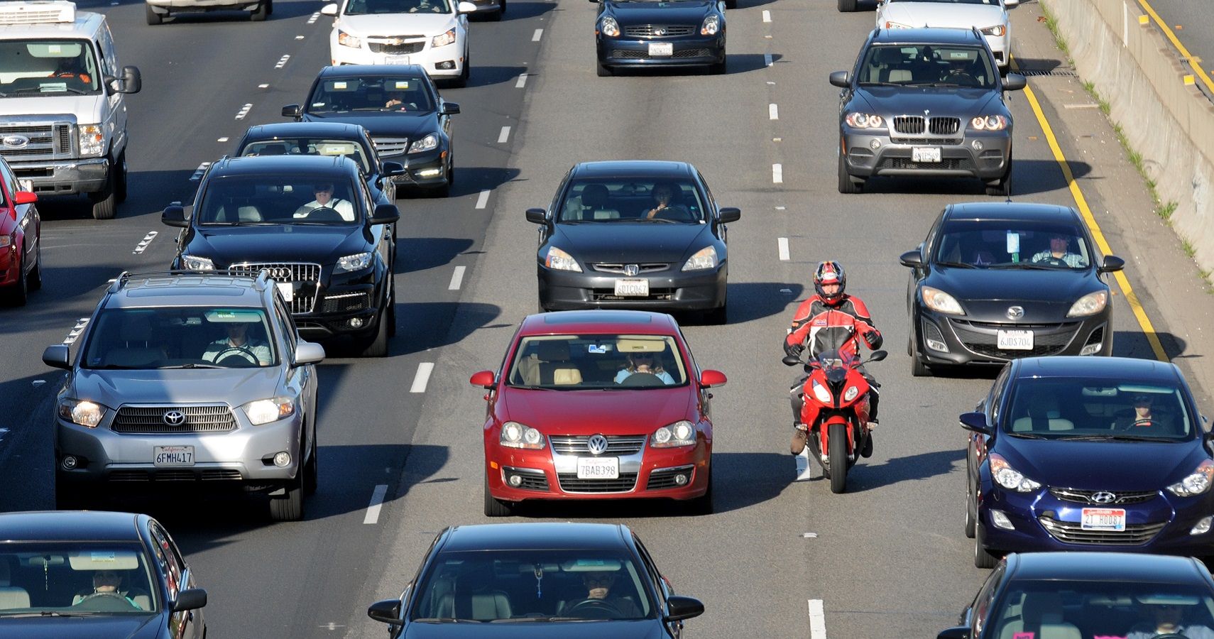 A Lane Splitting Motorcycle in Traffic
