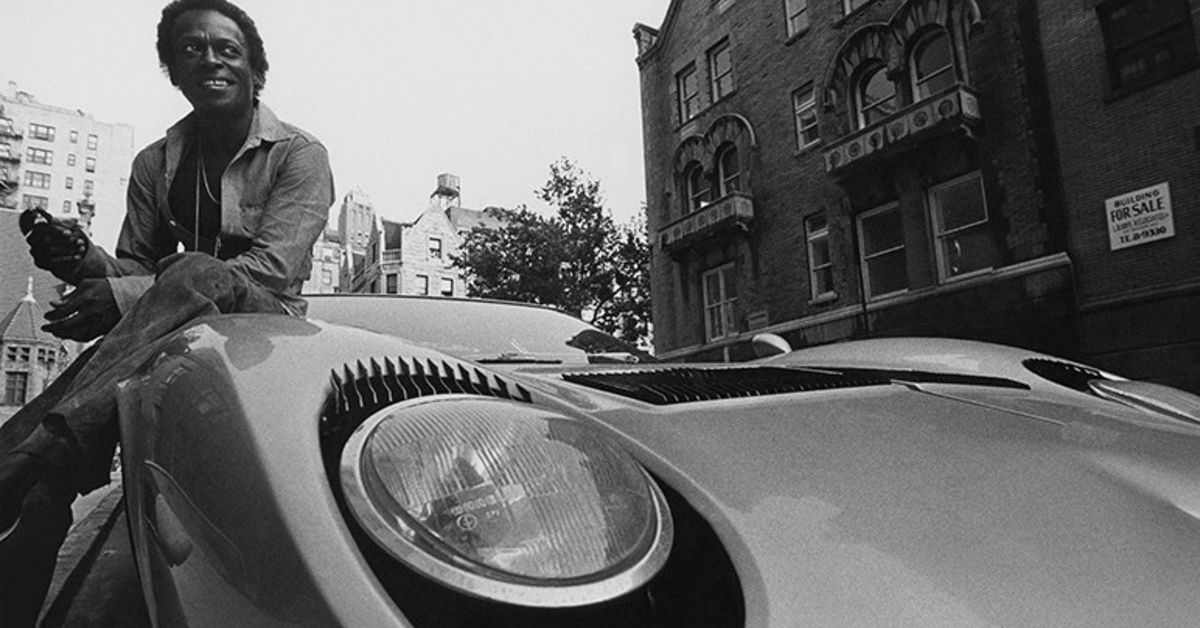 Miles Davis poses with his Lamborghini Miura
