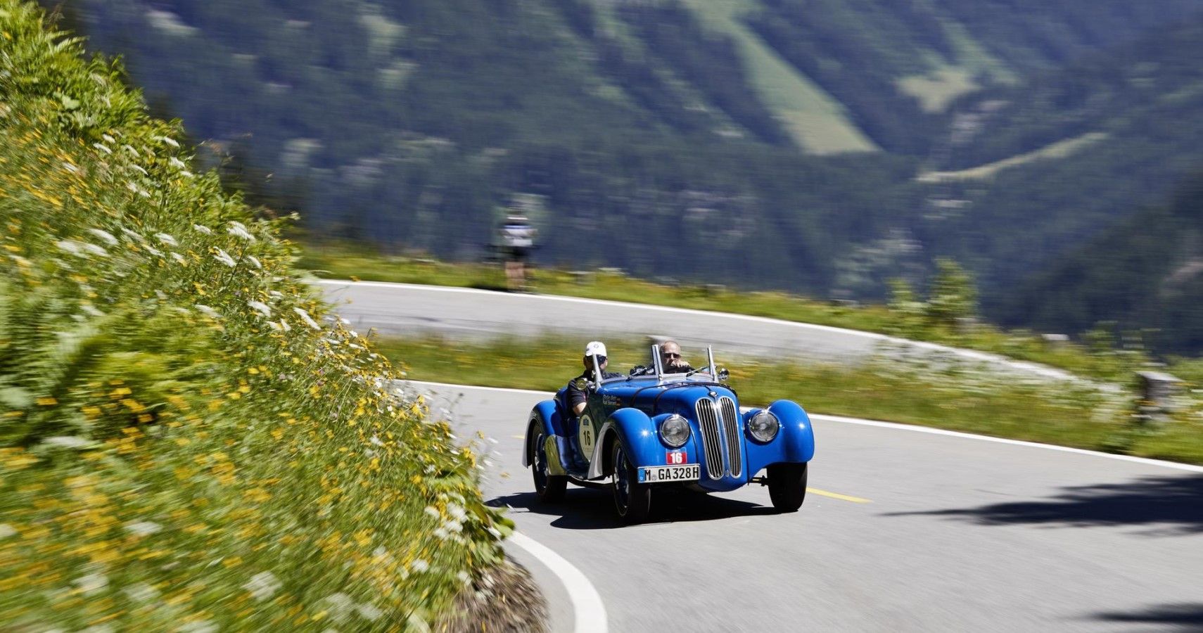 BMW 328 Roadster carving through the mountain roads