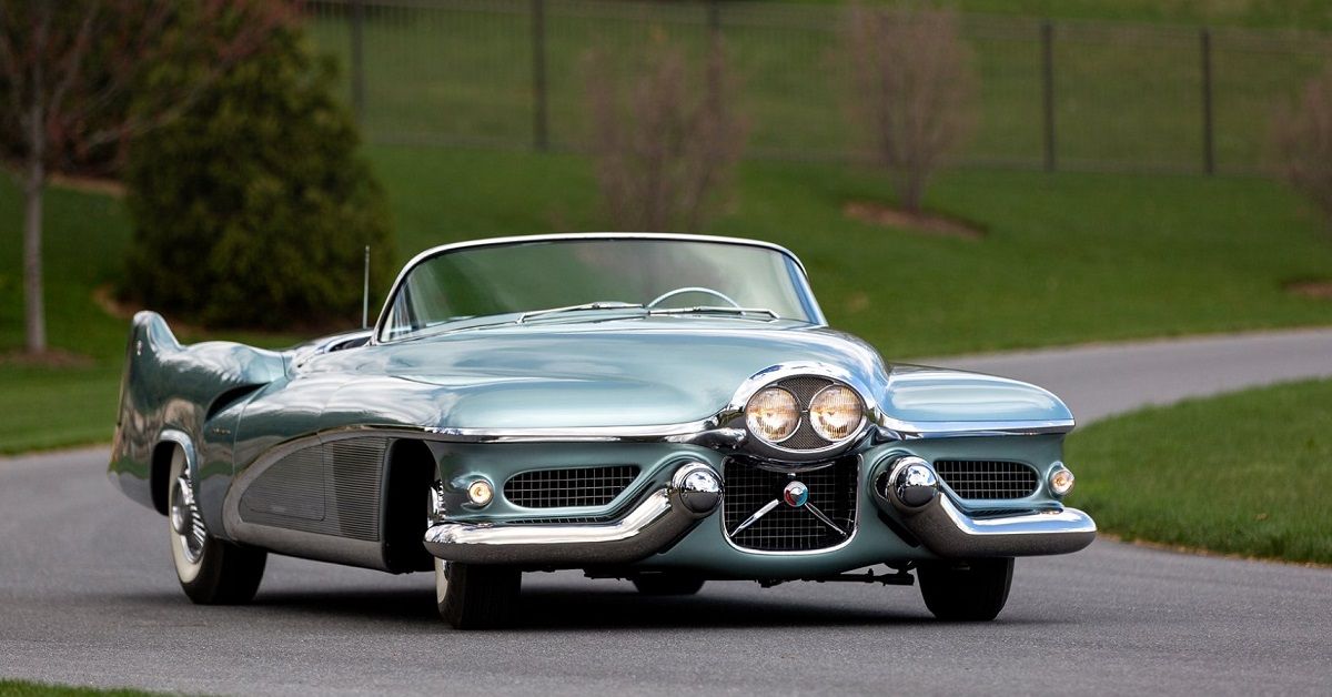 1951 GM LeSabre Concept Car on road with grass behind it