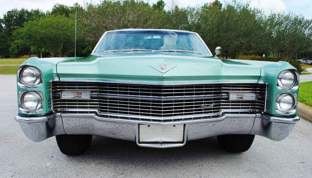Green 1966 Cadillac Deville convertible