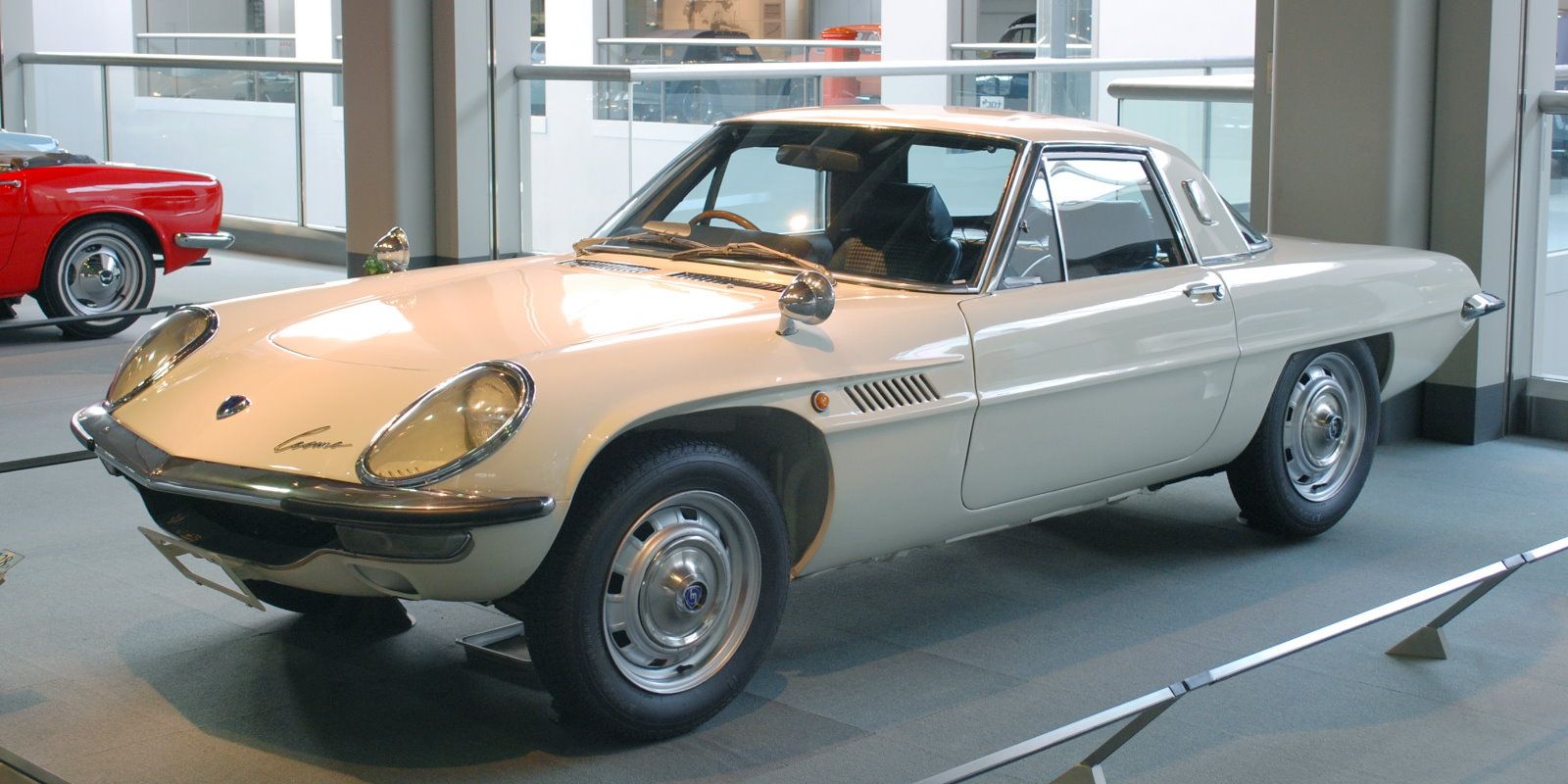 1967 Mazda Cosmo Sport in an auction shop.