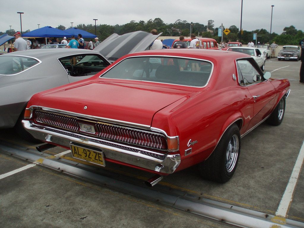 A red Mercury Cougar.