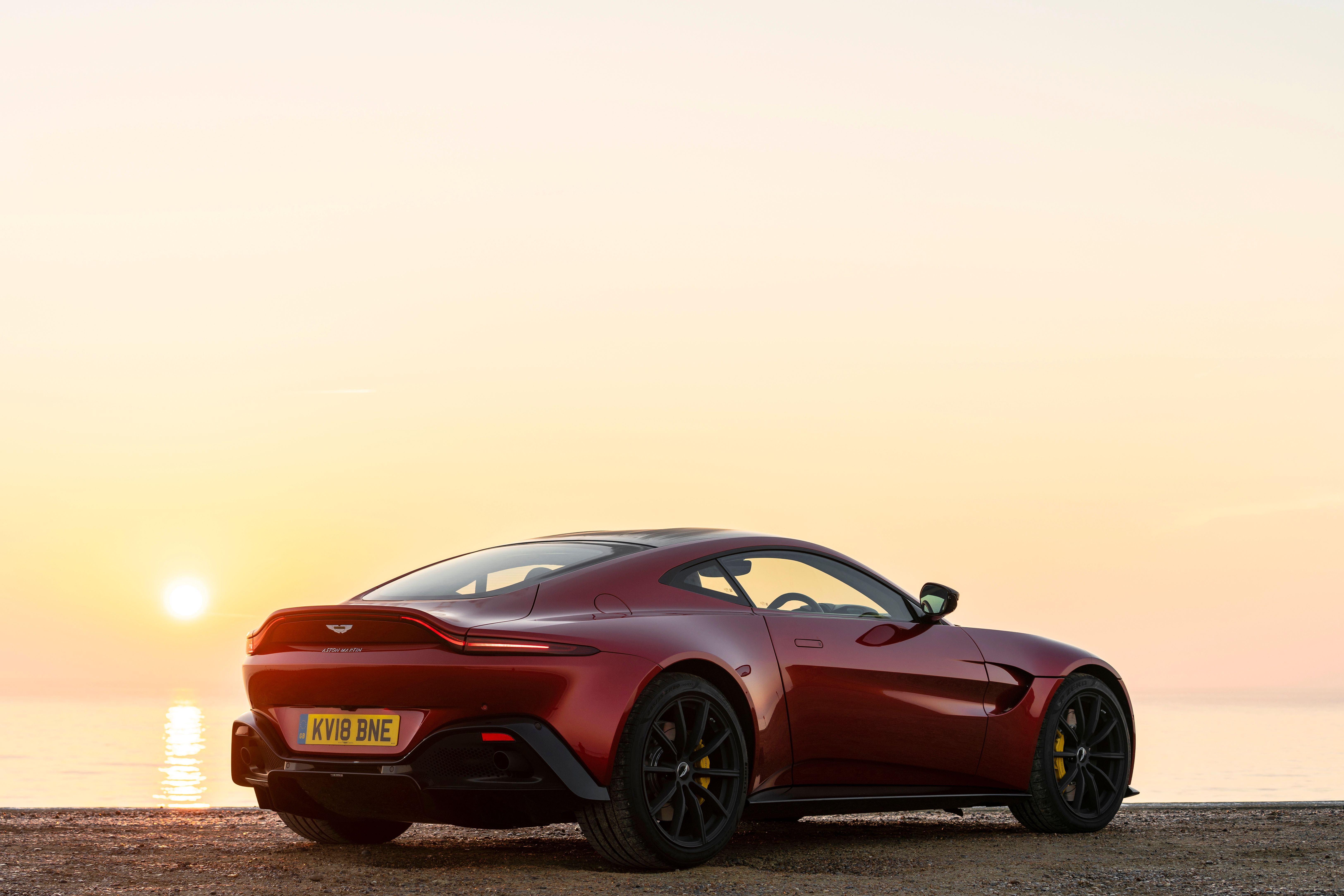 The rear of a red Vantage Coupe
