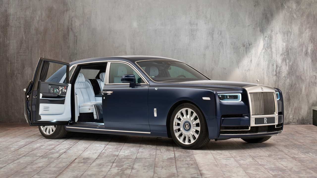 An Image Of A Blue 2021 Rolls Royce Phantom