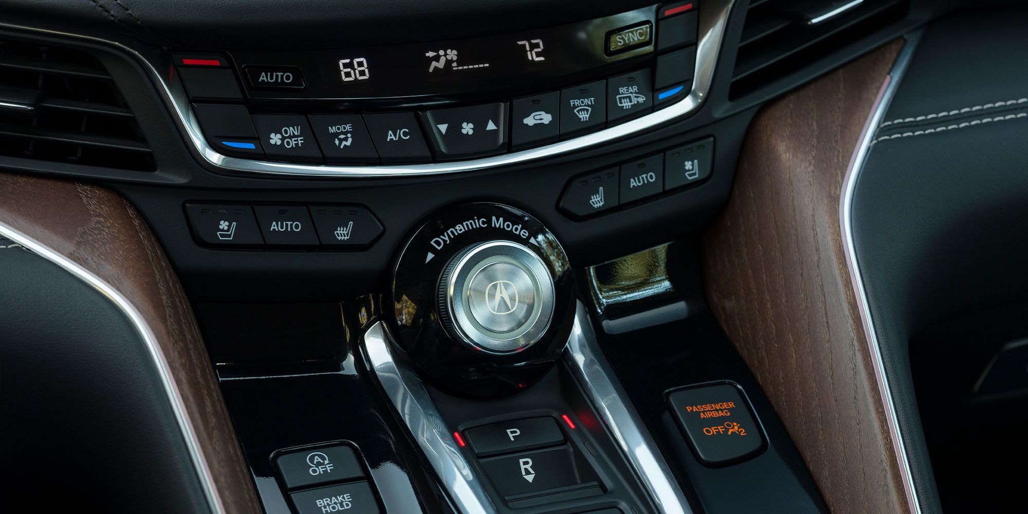 The center control stack in the TLX, showing the drive mode selector