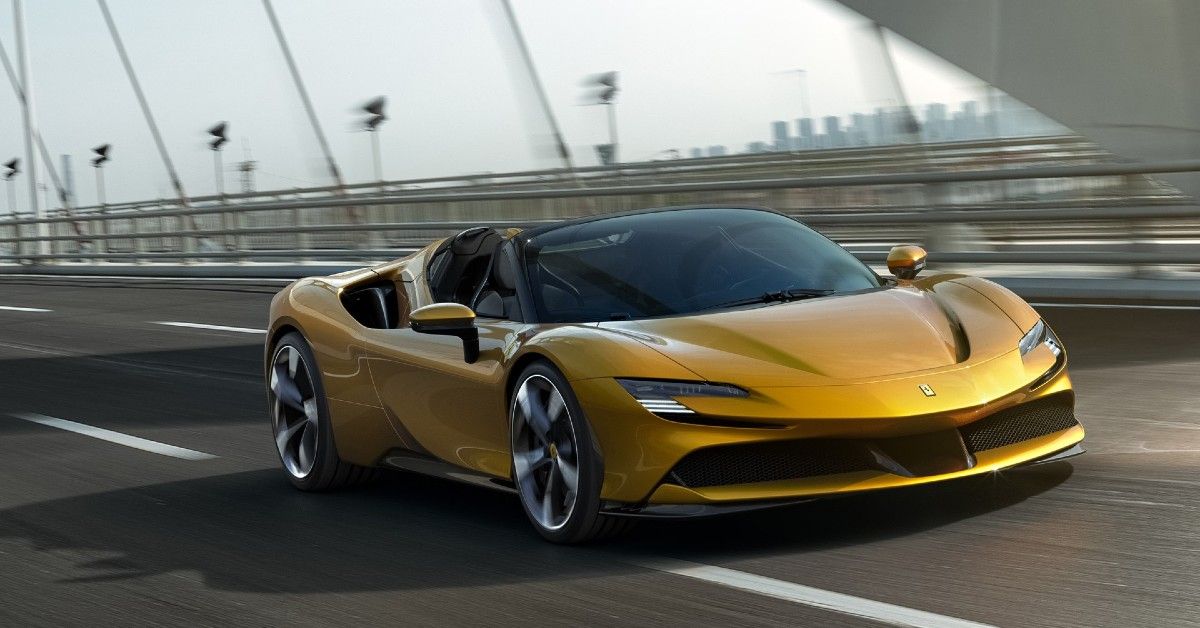 A Yellow Ferrari In Motion