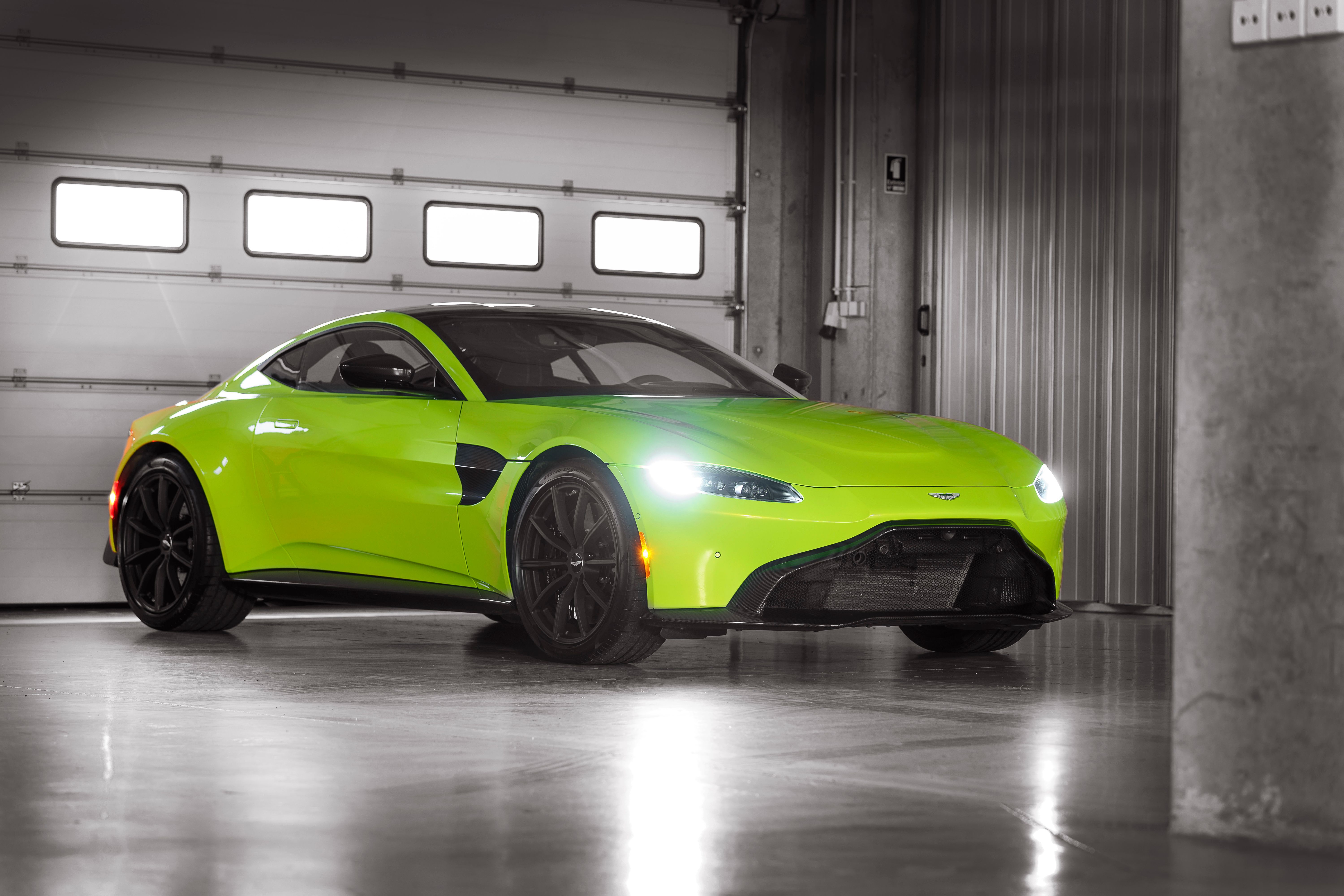 The front of a Lime Essence Vantage Coupe