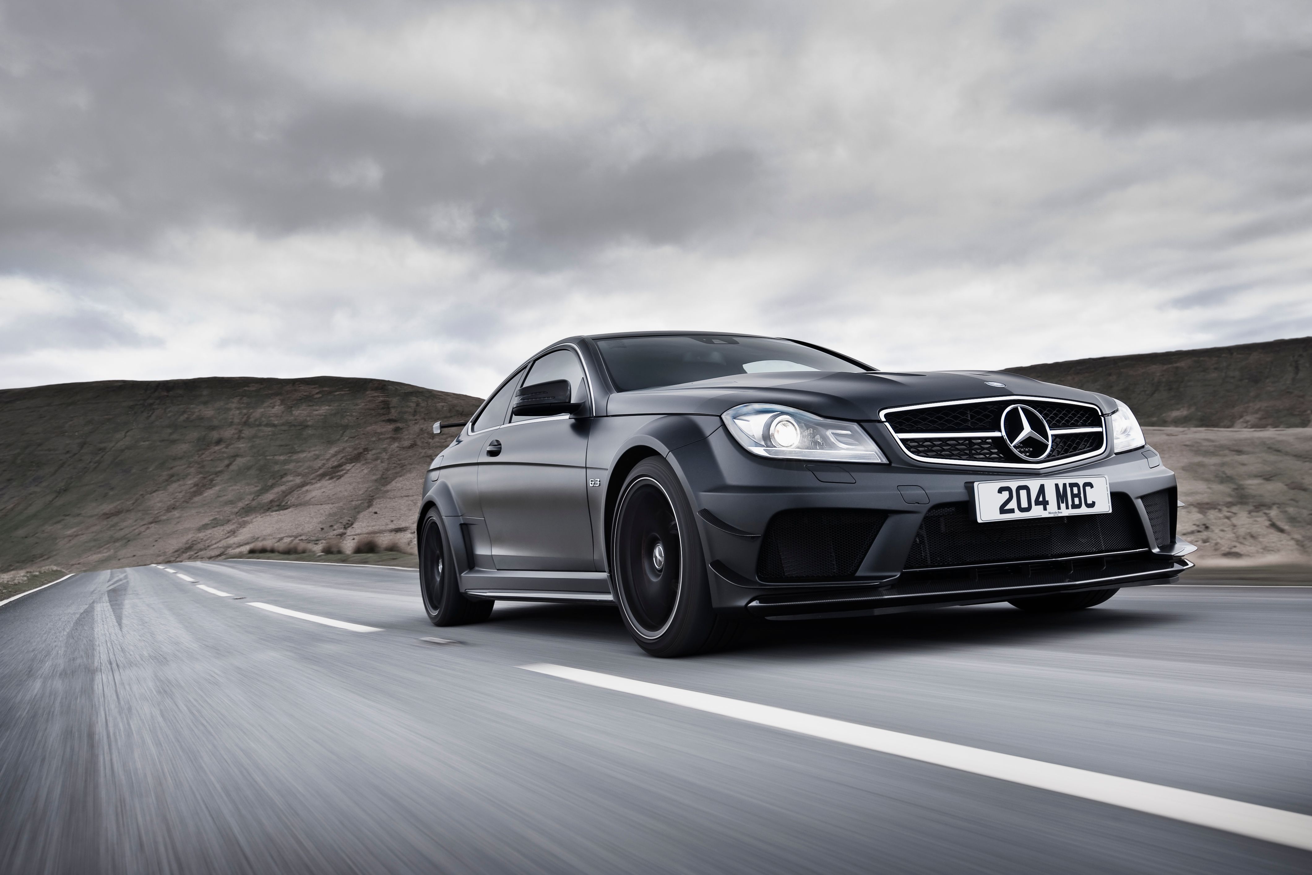 A Mercedes C 63 AMG Black Series on the road.