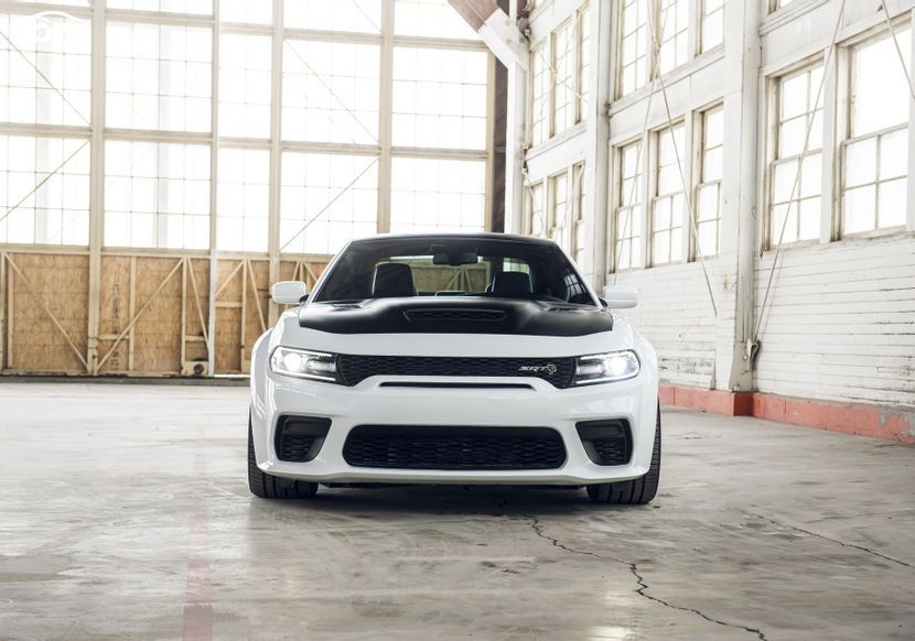 White 2021 dodge charger with black hood
