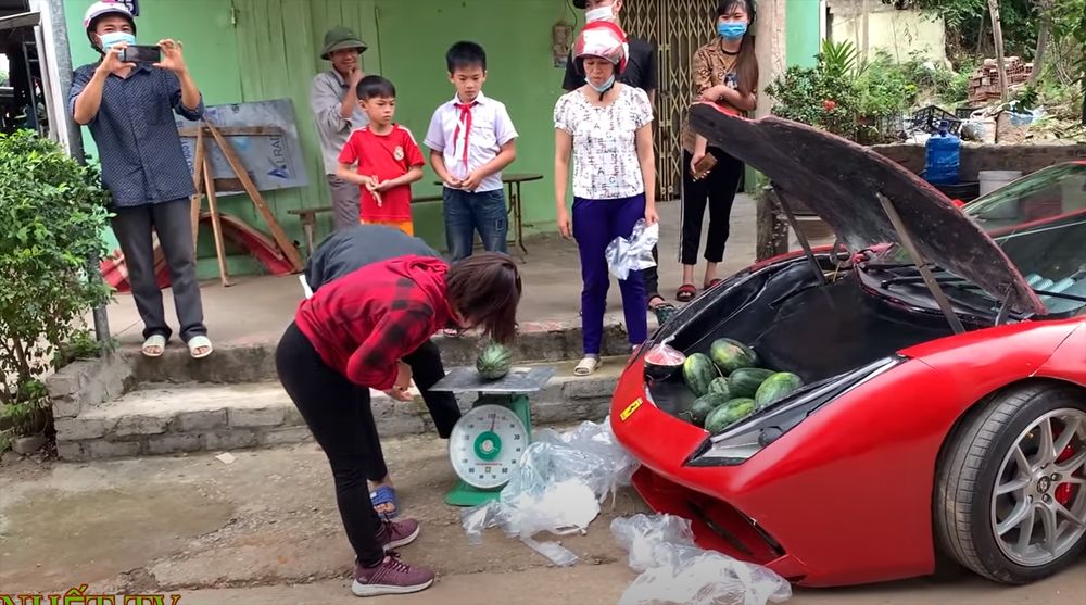 Ferrari 488 GT selling melons in Vietnam neighborhood