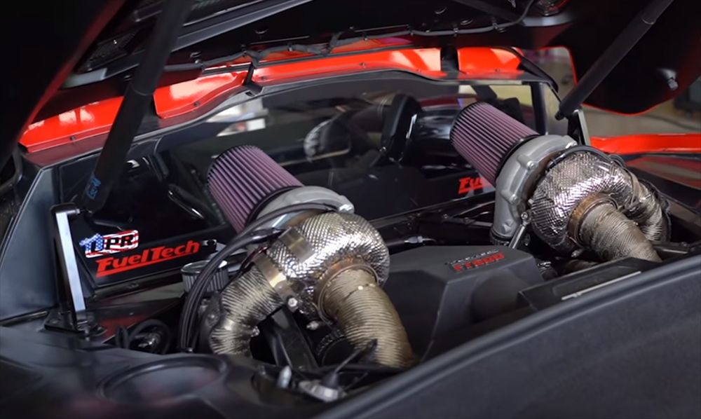 FuelTech USA red C8 Corvette with pair of G35 turbos