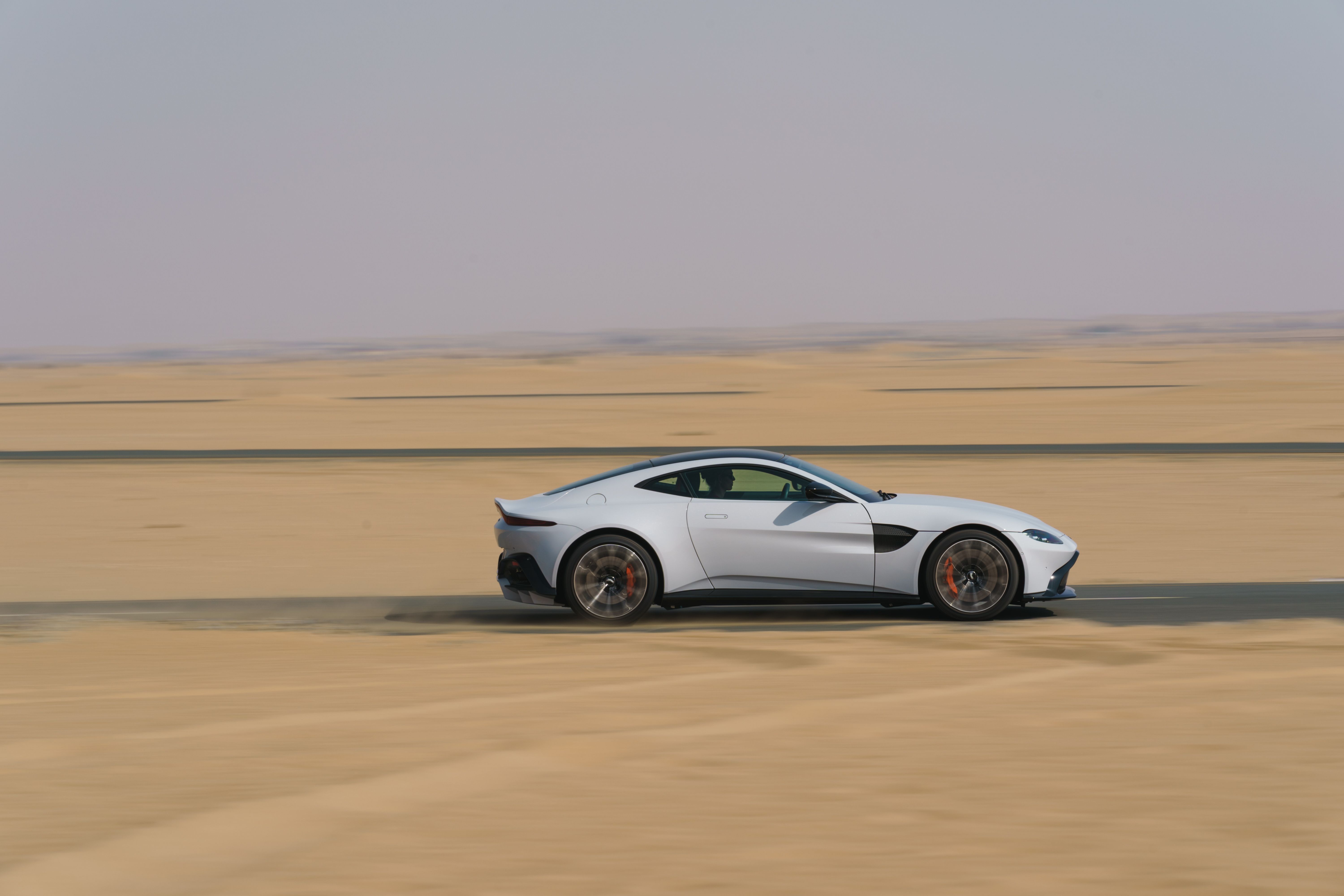 The side of the Aston Martin Vantage Coupe in white
