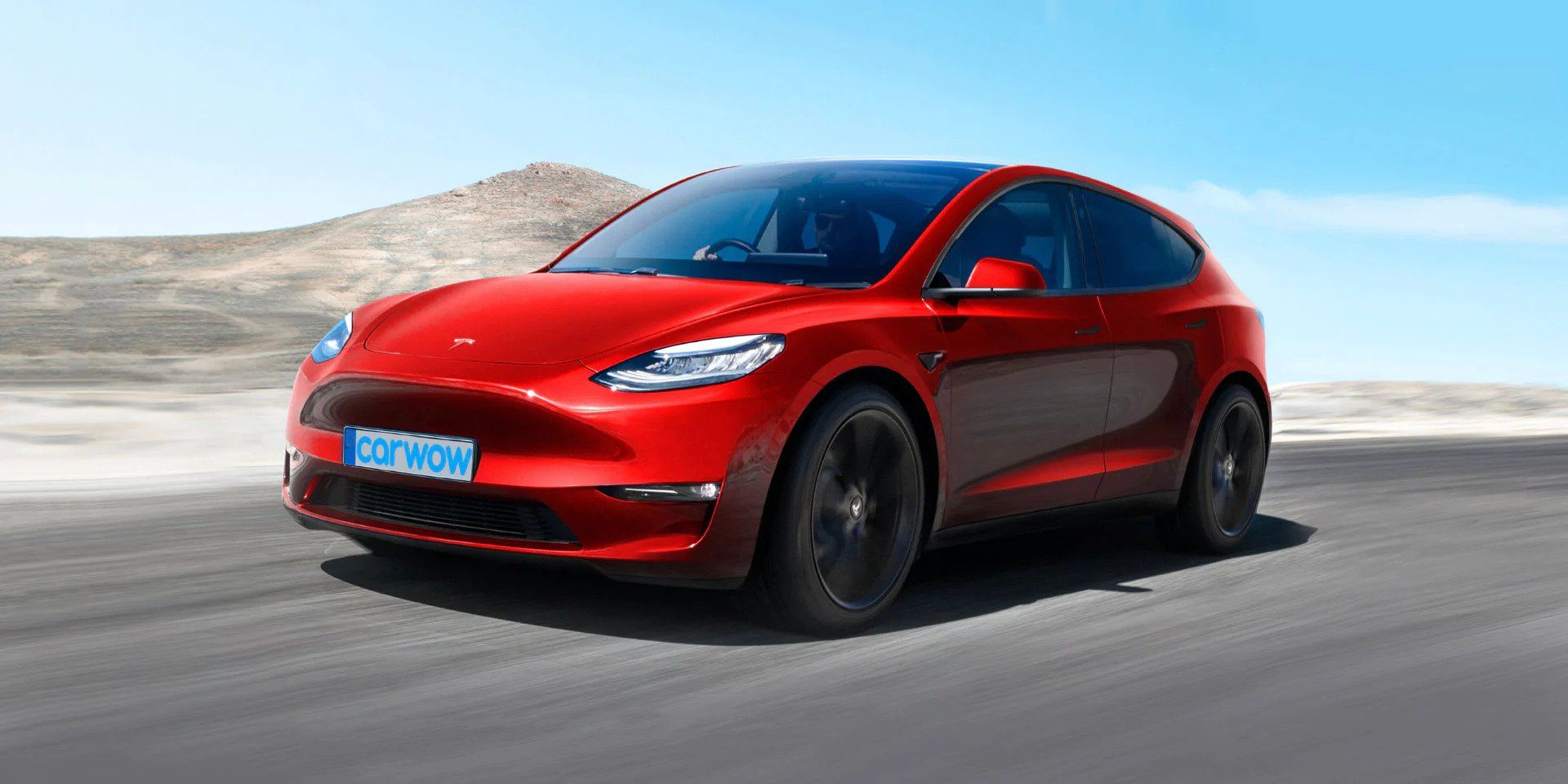 An Image Of A Red Tesla Model 2