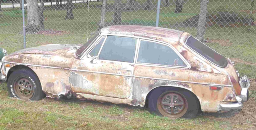 Abandoned MG sedan believed to be a GT