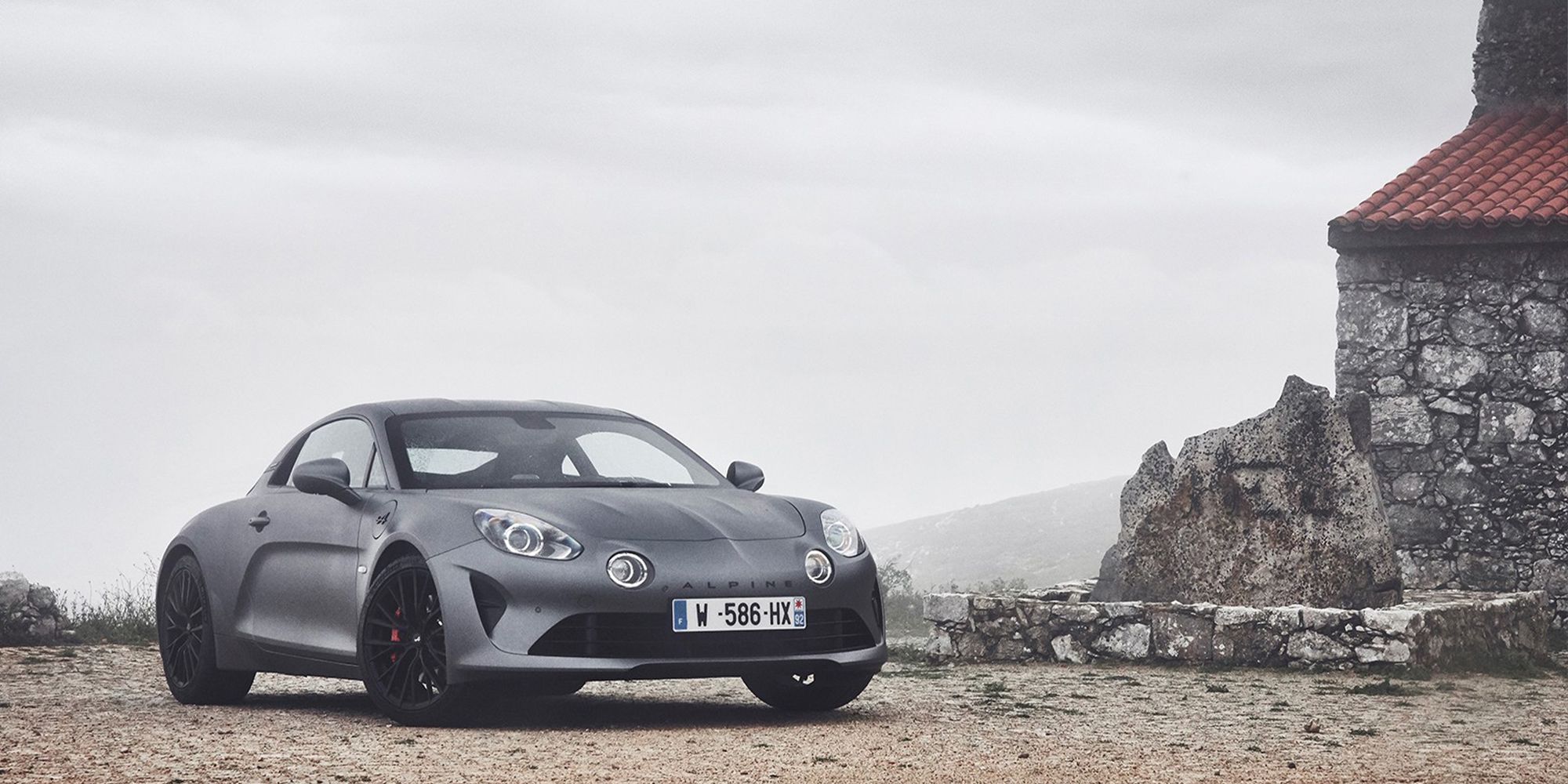 The front of a matte grey Alpine A110