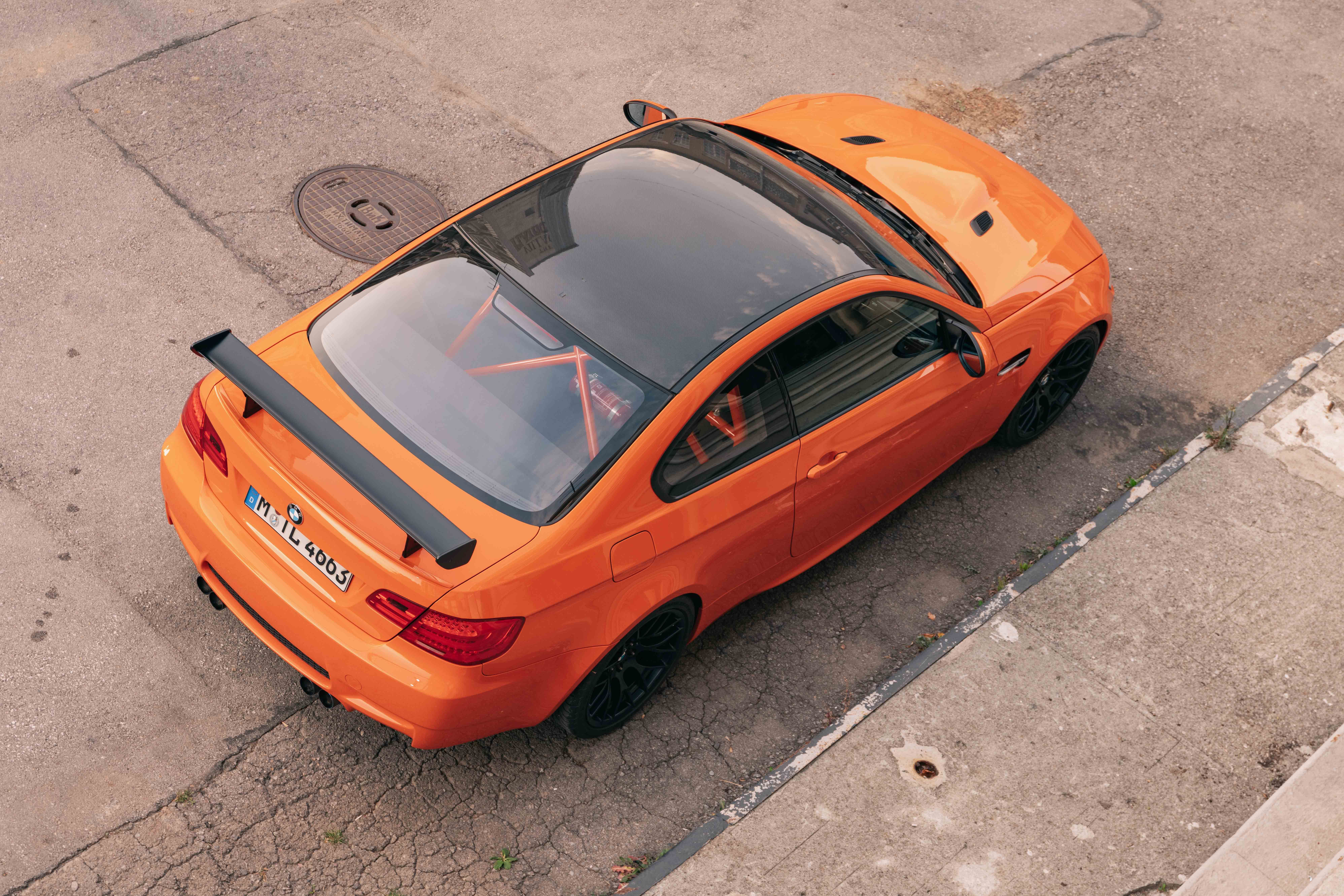 An orange BMW M3 GTS.