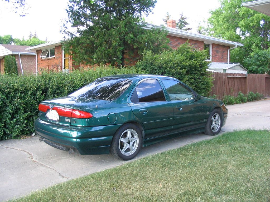 A Ford Contour in green.