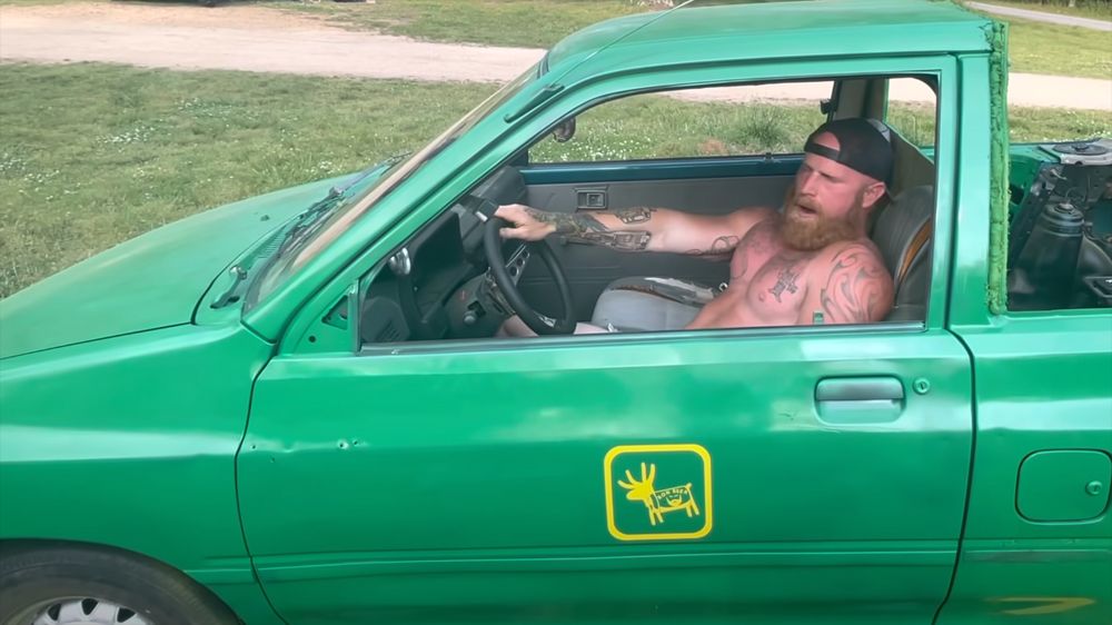 Ginger Billy driving his Ron Beer lawnmower